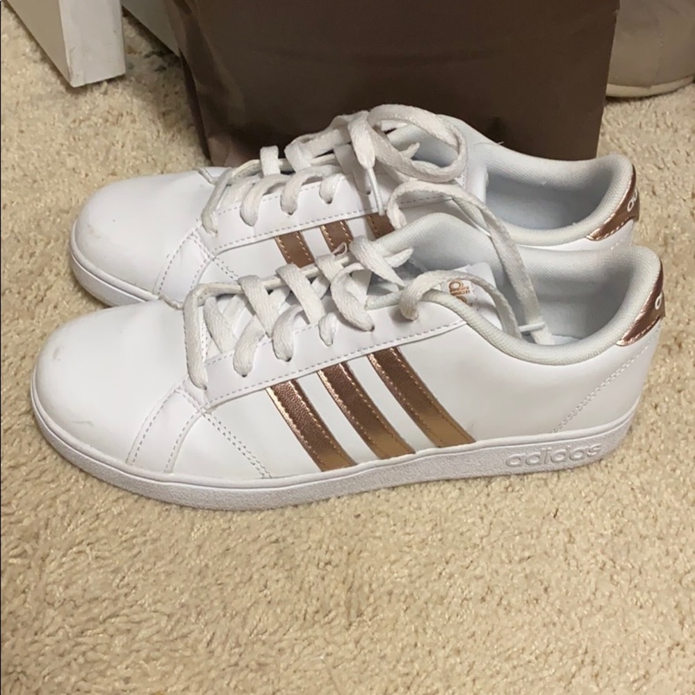 Rose gold and white Adidas neo